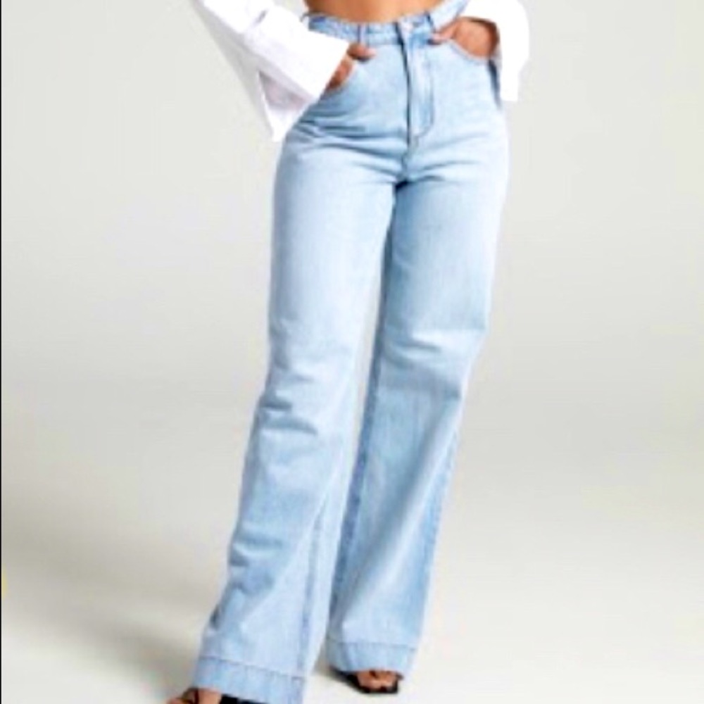 Straight leg light blue high waisted jeans.